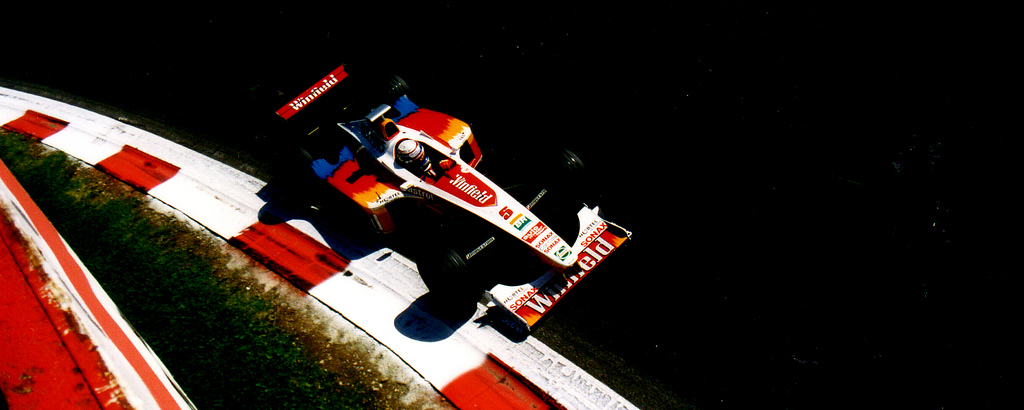 White and red Williams FW21 with Winfield logos and number 5 on the kerb at Monza