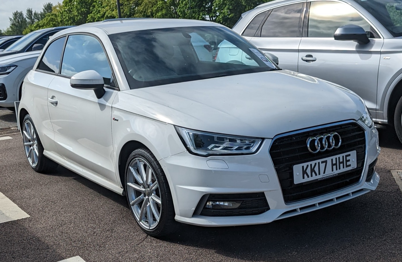 White facelifted Audi A1 S line three-door on a dealer forecourt