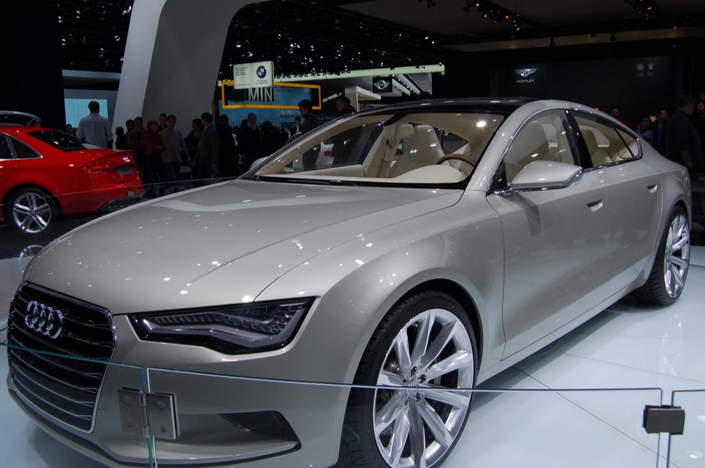 Silver Audi Sportback concept car on a show stand, seen from the front three-quarter