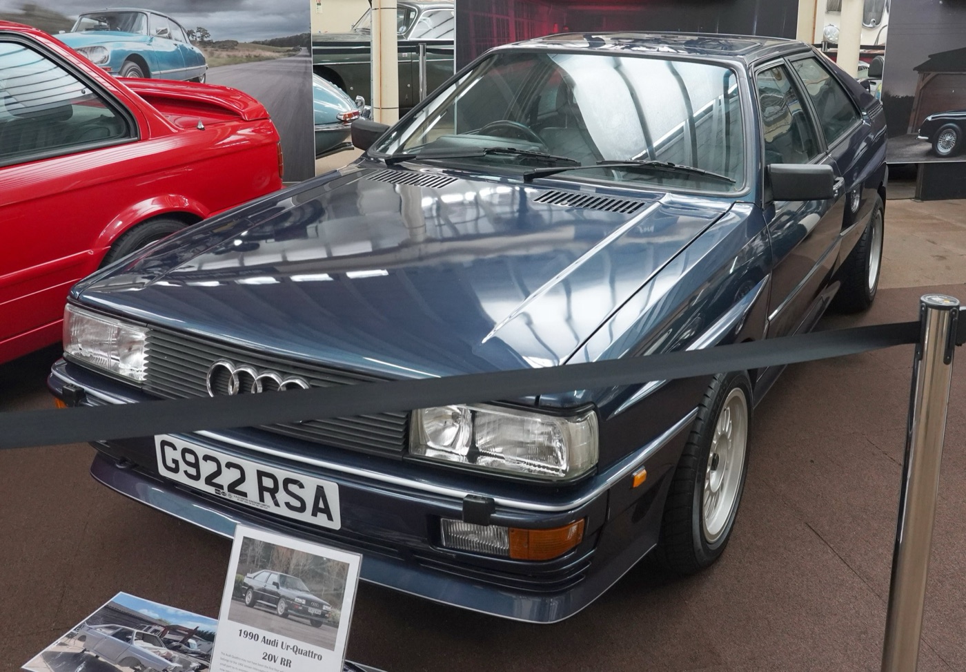 Dark blue Audi Ur-Quattro 20V RR with British registration G922 RSA behind a rope barrier in a museum