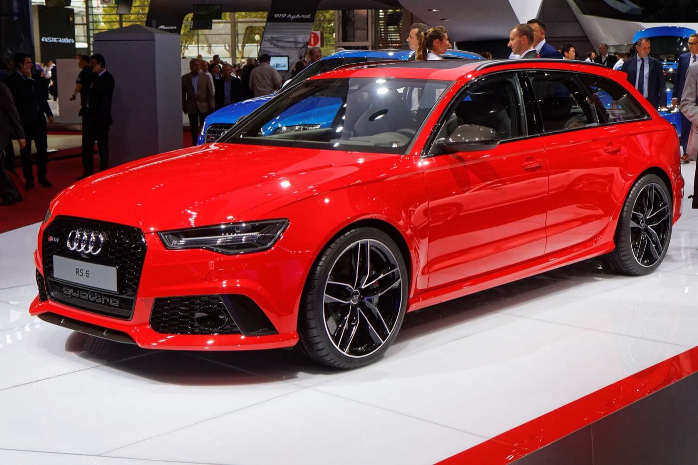 Red facelifted Audi RS6 Avant with black wheels on Audi