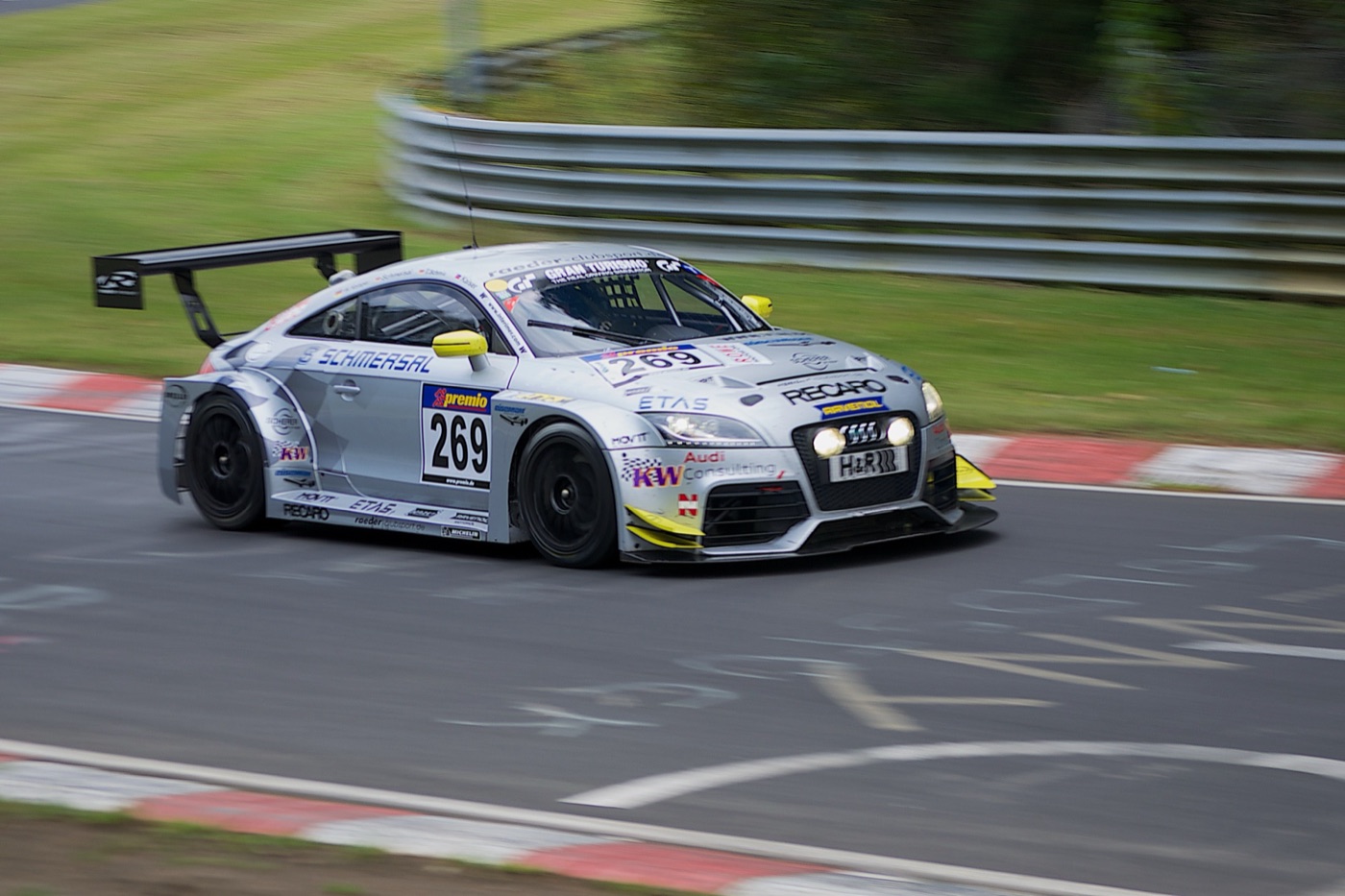 Silver Raeder Motorsport Audi TT RS race car number 269 with a large rear wing on the Nordschleife