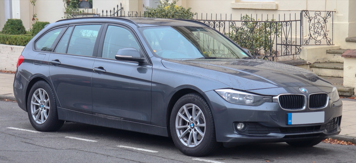 Grey BMW 320d EfficientDynamics Touring F31 estate parked on a residential street