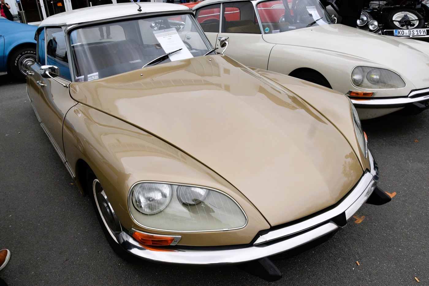 Gold 1970 Citroën DS 21 Pallas seen from above the front, showing the faired-in twin headlamps of the 1967 restyle