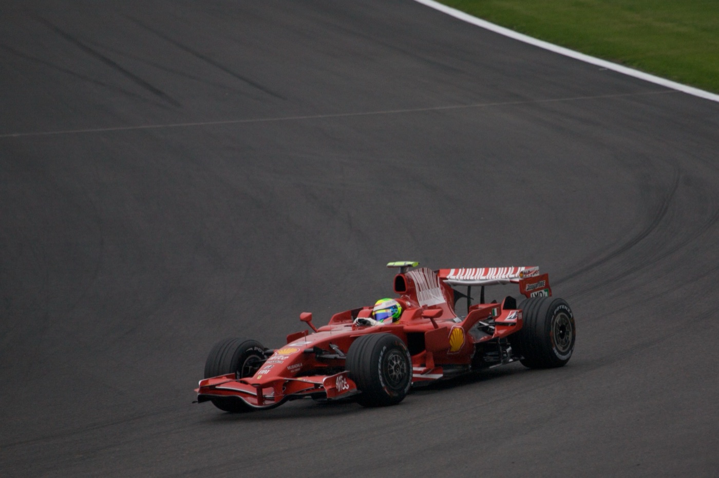 Felipe Massa’s red Ferrari F2008 on a sweeping corner at Spa-Francorchamps, seen from above