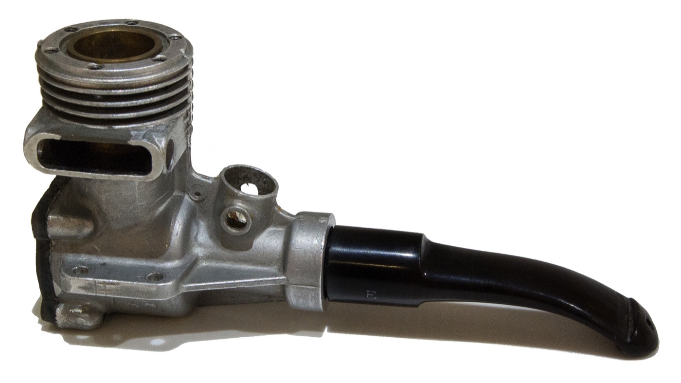 Aluminium Porsche Design tobacco pipe with a finned bowl like an air-cooled cylinder and a black curved stem