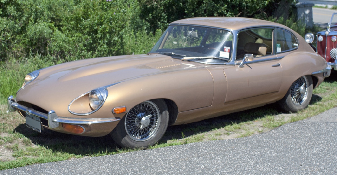 Gold Series 2 E-Type 2+2 coupé with open headlamps, wrap-round bumpers and a taller windscreen