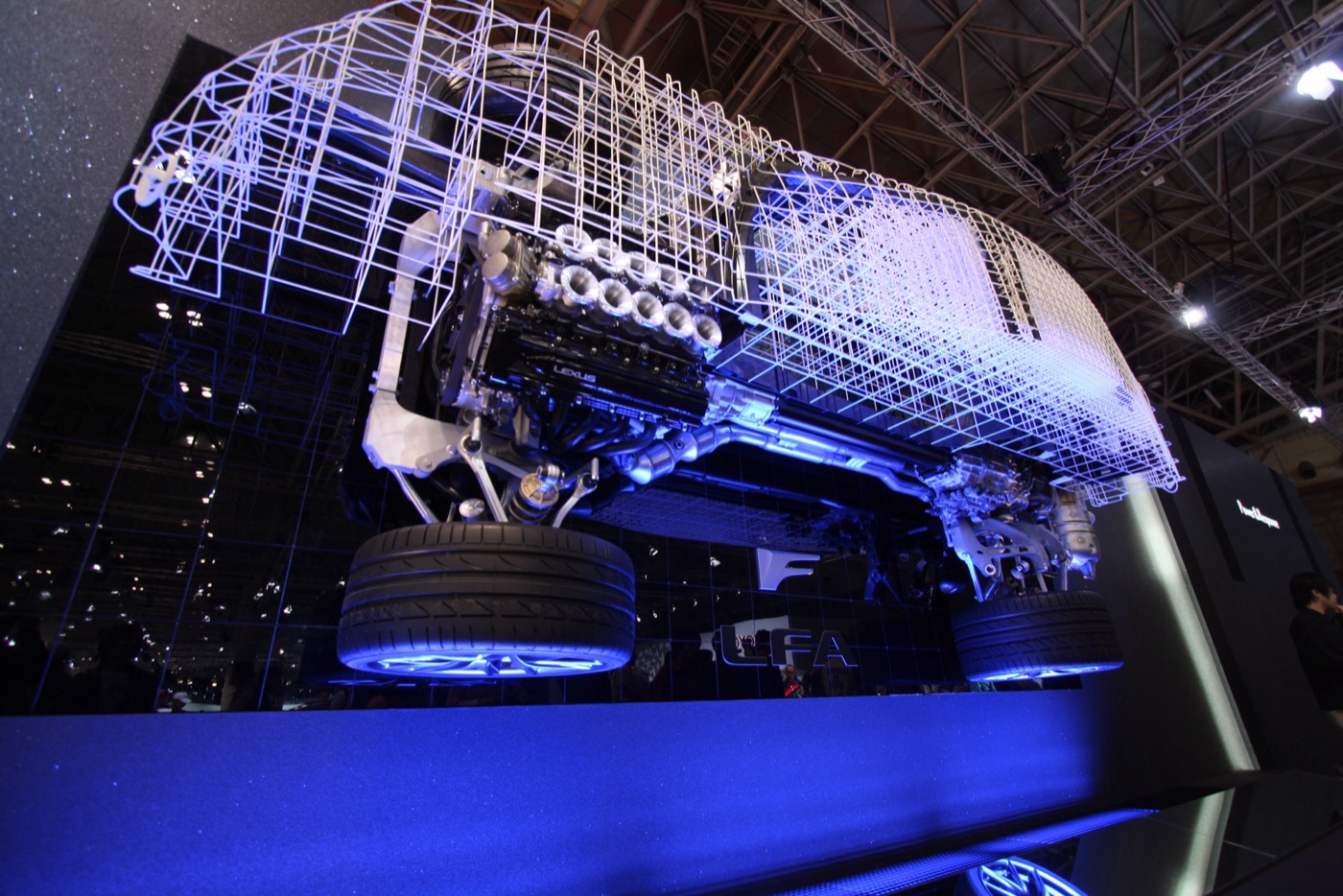 Wire-frame display of the Lexus LFA showing the V10 engine, exhaust and rear transaxle on their subframes