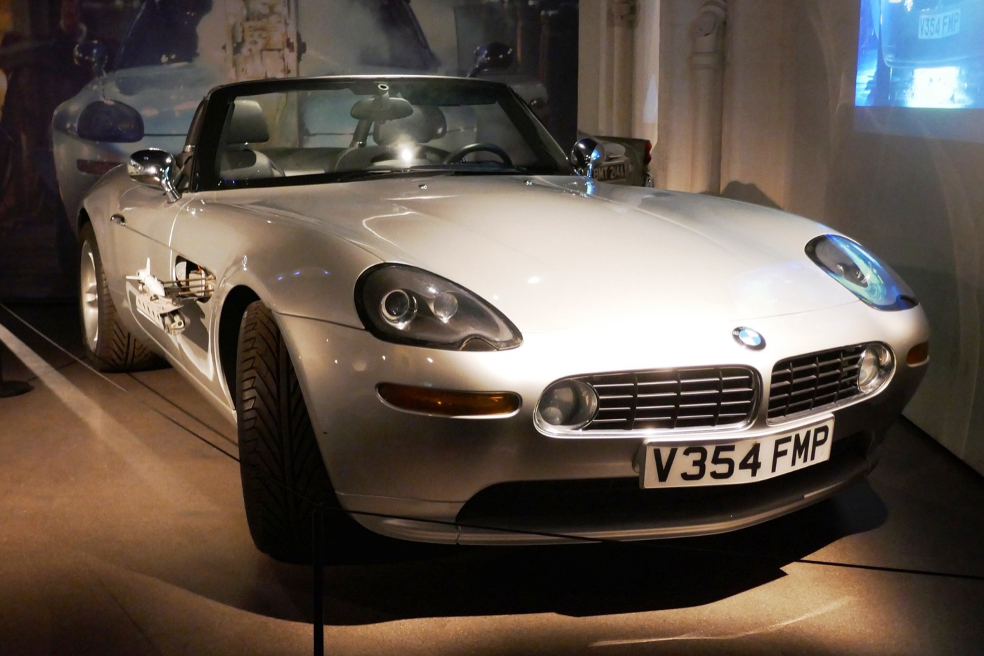 Silver BMW Z8 roadster with the registration V354 FMP and a missile launcher in its side vent