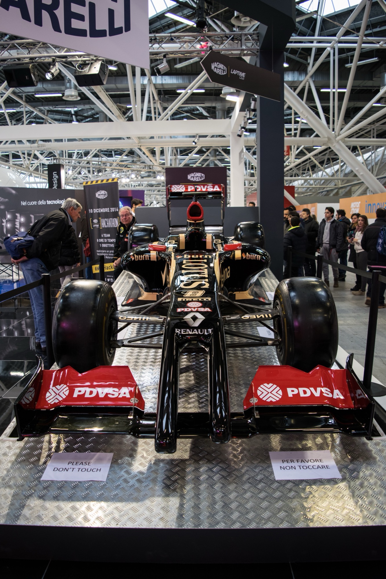 Black Lotus E22 seen head-on on a display stand, its nose split into two prongs of different length