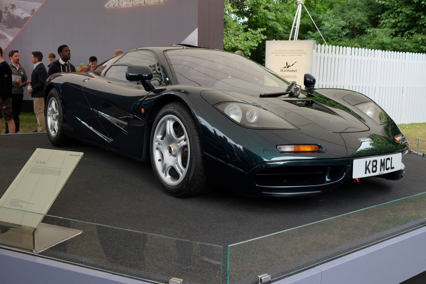 Dark green McLaren F1 prototype XP5 on a display plinth, registration K8 MCL