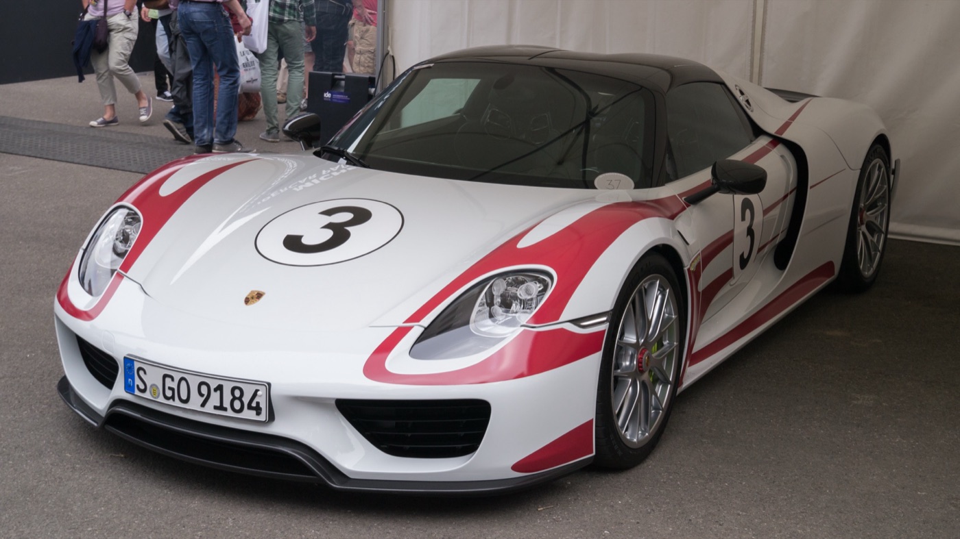 White Porsche 918 Spyder with red Salzburg stripes and a large number 3 on the bonnet, carbon roof fitted