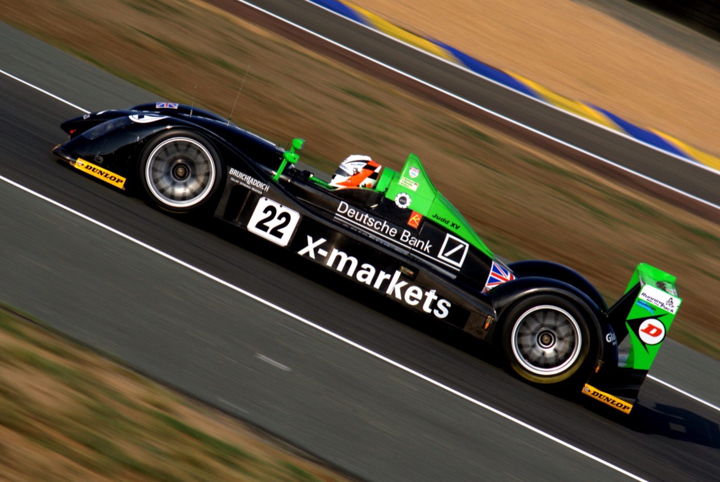 Black and green Radical SR9 LMP2 prototype number 22 at speed at Le Mans