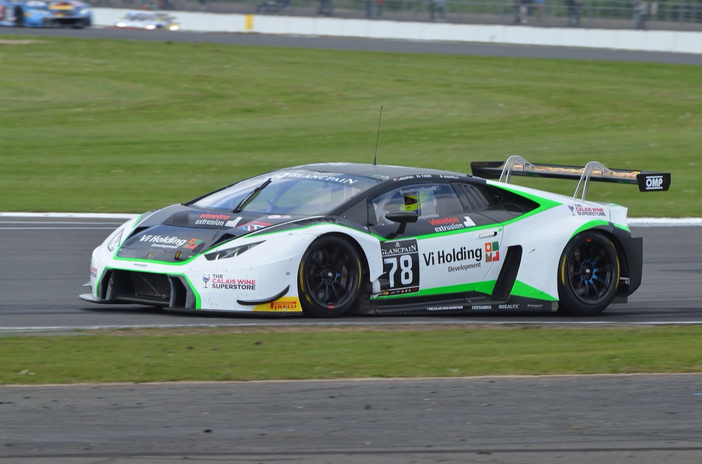 White and green Lamborghini Huracán GT3 number 78 racing at Silverstone