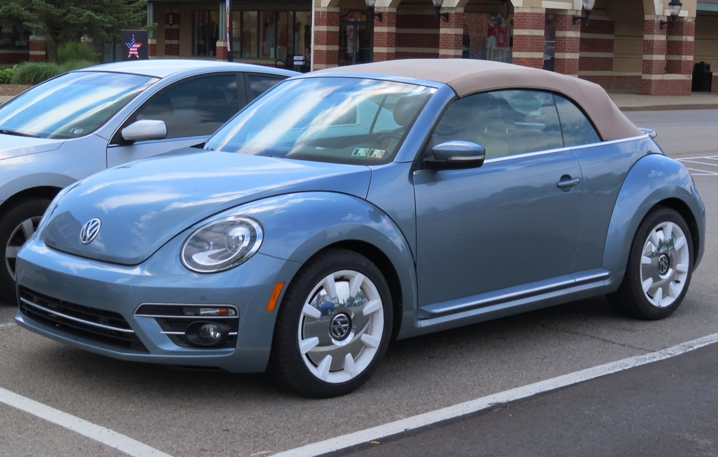 Light blue Volkswagen Beetle Final Edition SEL convertible with a brown roof and white wheel inserts
