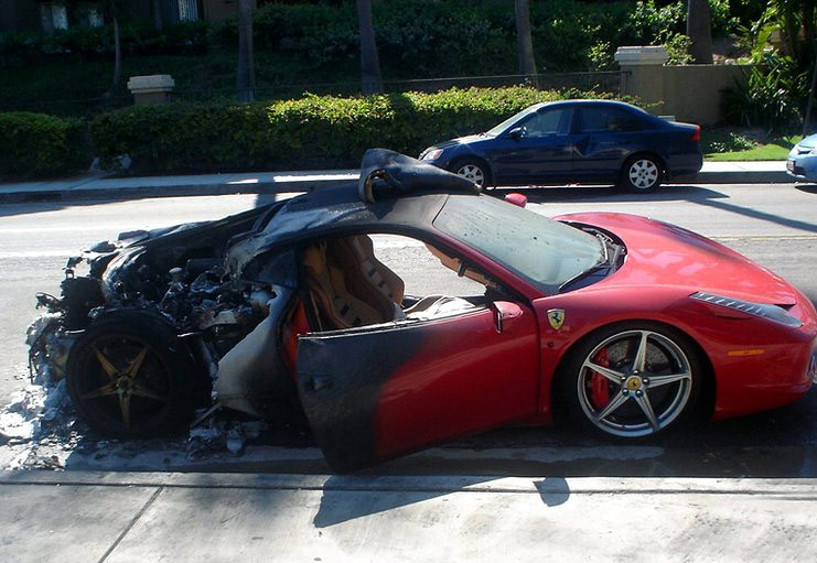 The remains of a Ferrari 458 Italia which erupted into flames in Costa Mesa, California last week.