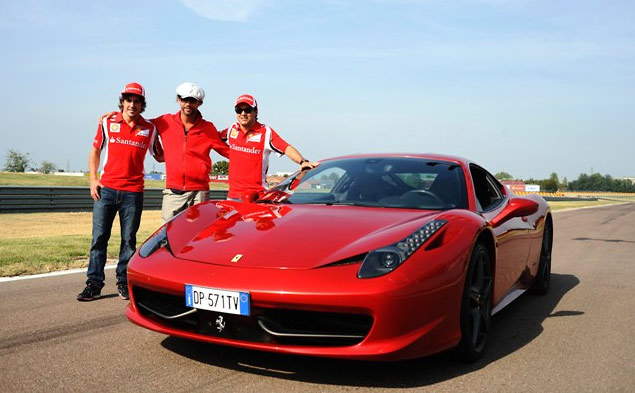 Jay Kay from Jamiroquai with Fernando Alonso and Felipe Massa