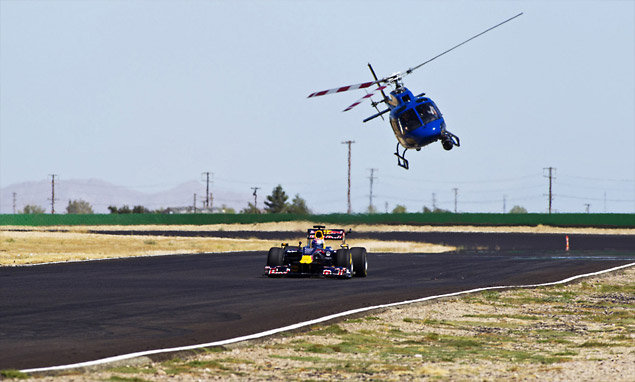 Tom Cruise drives a Red Bull F1 car