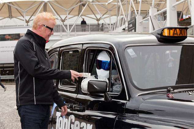 Top Gear's Stig gives DJ Chris Evans a taxi ride to remember..